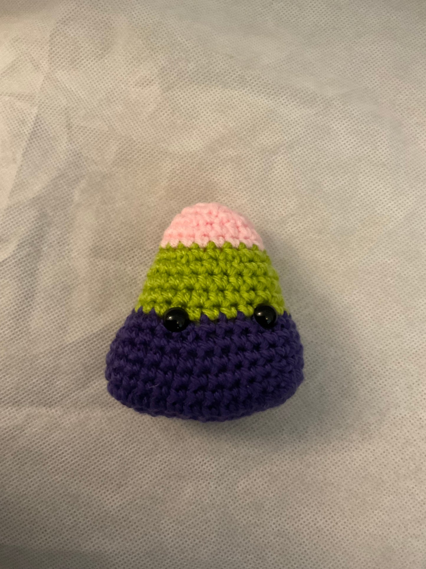 Amigurumi candy corn with eyes
