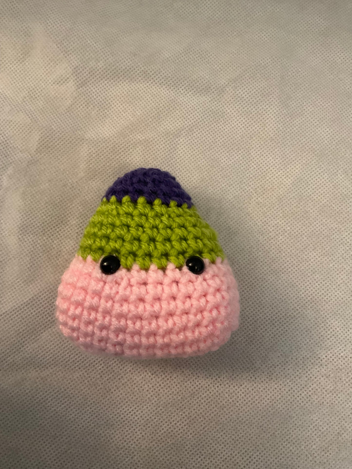 Amigurumi candy corn with eyes