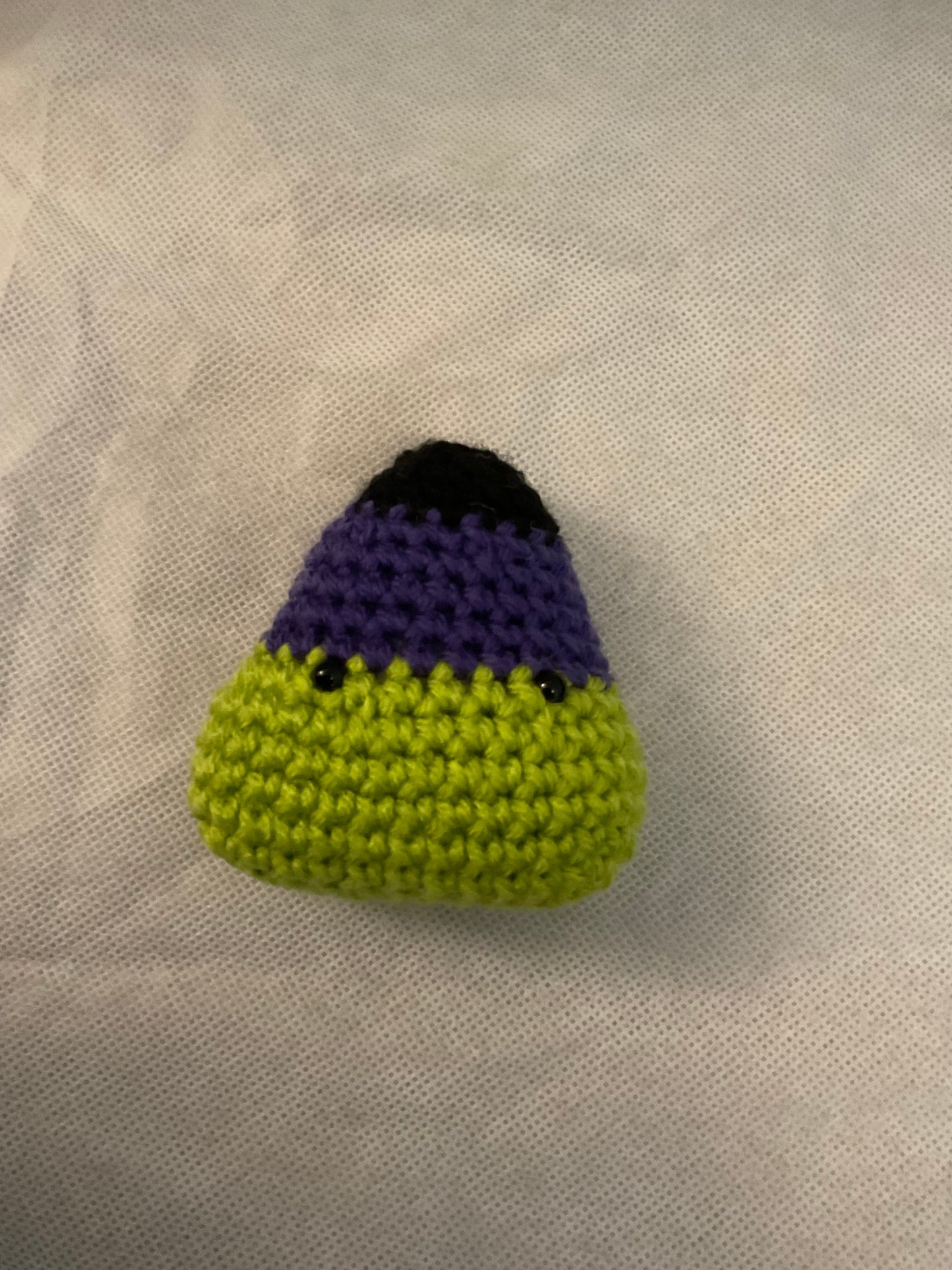 Amigurumi candy corn with eyes